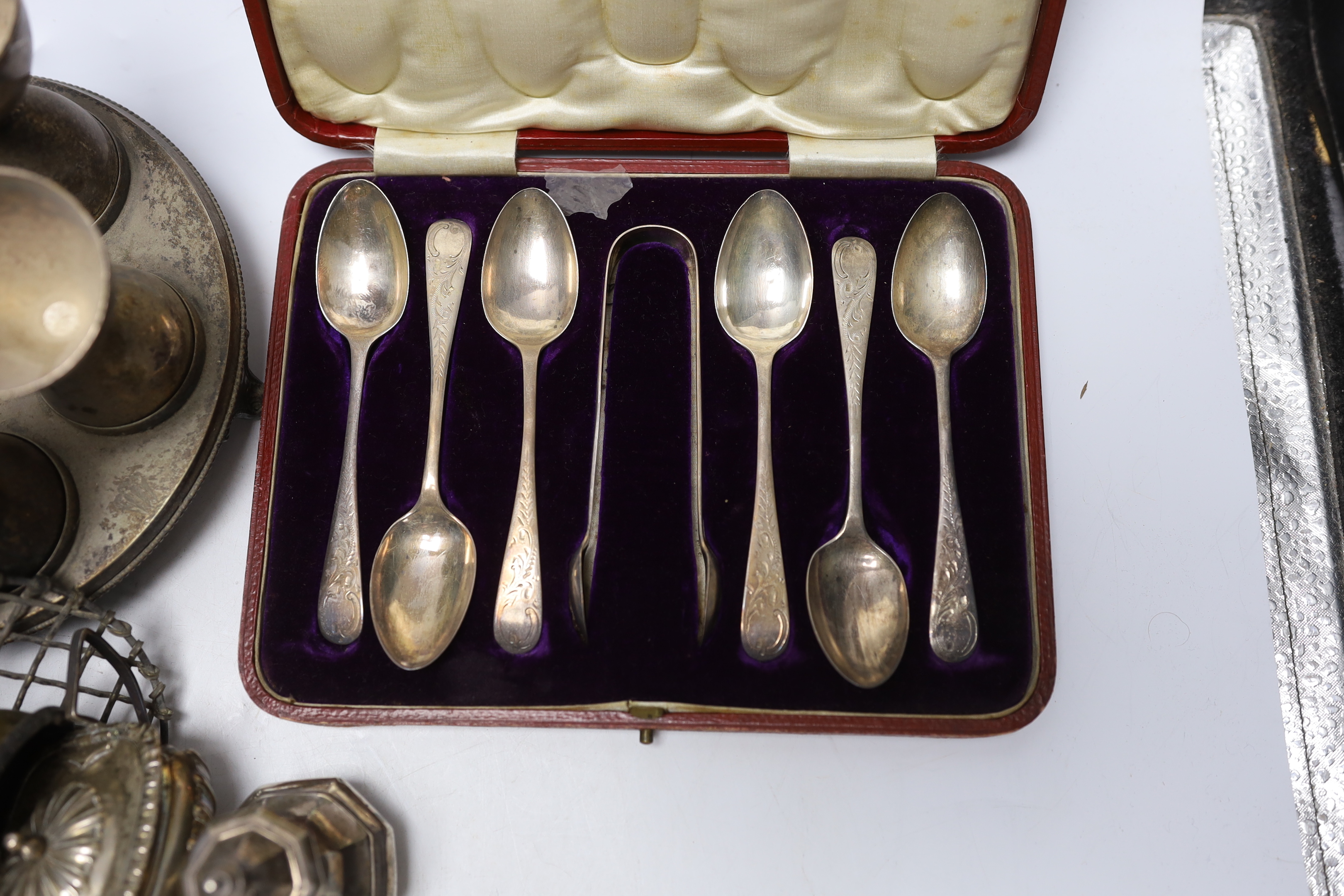 Sundry silver including three piece condiment set, two cased sets of teaspoons, five other condiments, salt spoons, pair of small pierced holders, inkwell and a small rose bowl, together with various plated items.